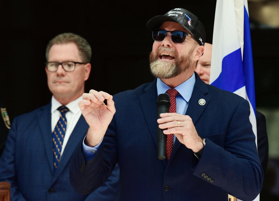 U.S. Rep. Aaron Bean addresses the audience during a pro-Israel rally in front of Jacksonville's City Hall building in October.