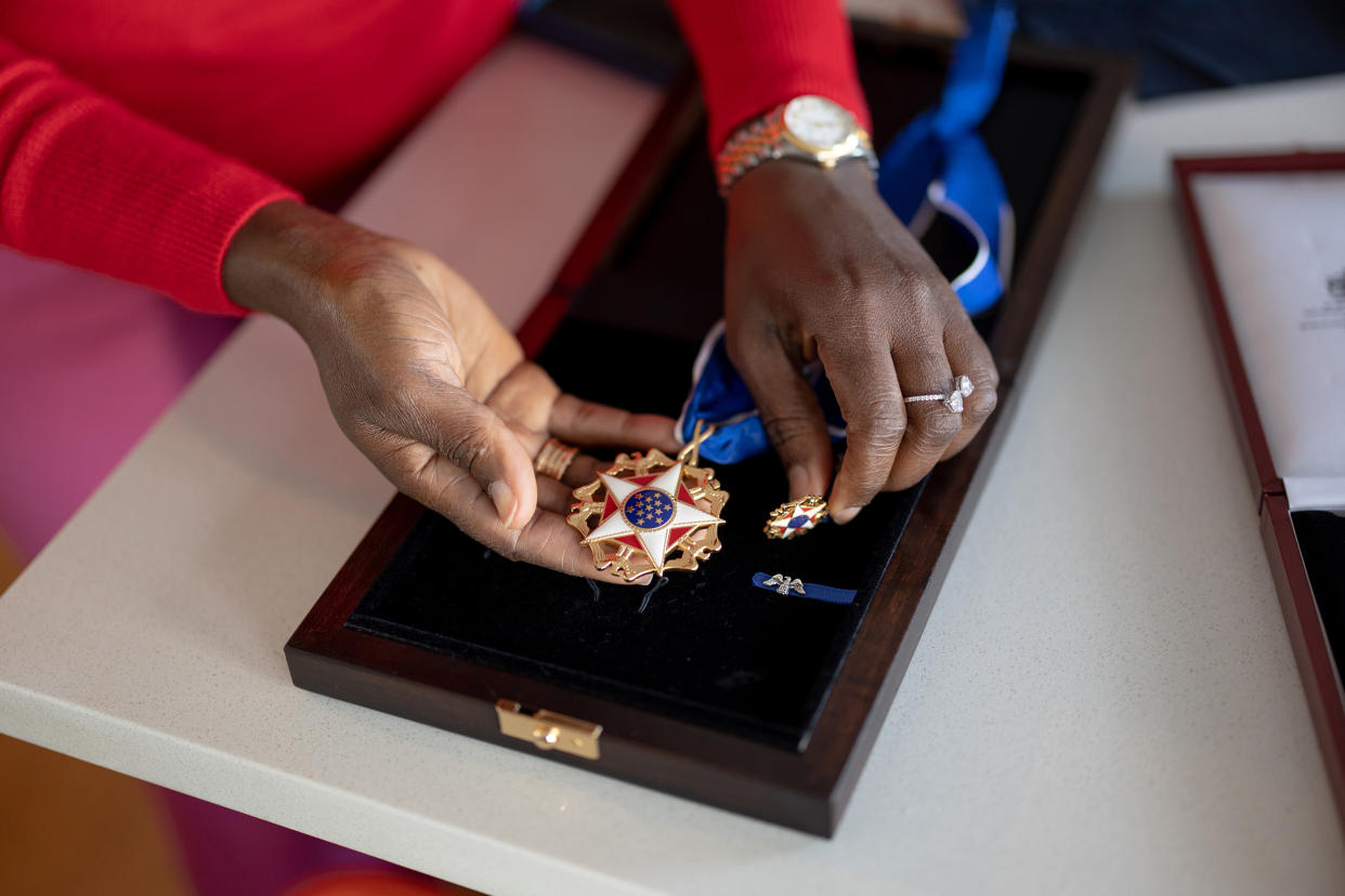 Sandra Lindsay with the Presidential Medal of Freedom she received from President Joe Biden. (Roshni Khatri for NBC News)