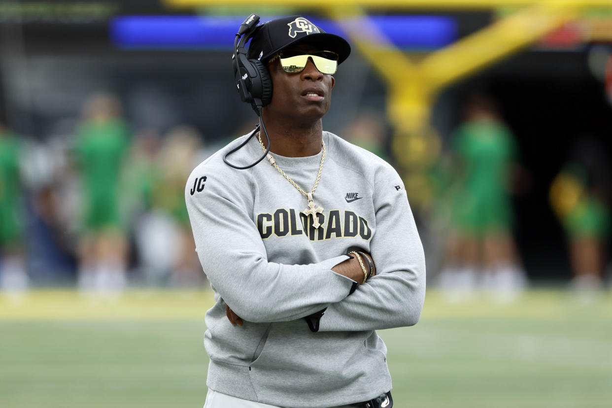 Colorado coach Deion Sanders watches the replay board during the first half against the Oregon Ducks at Autzen Stadium. (Soobum Im-USA TODAY Sports)