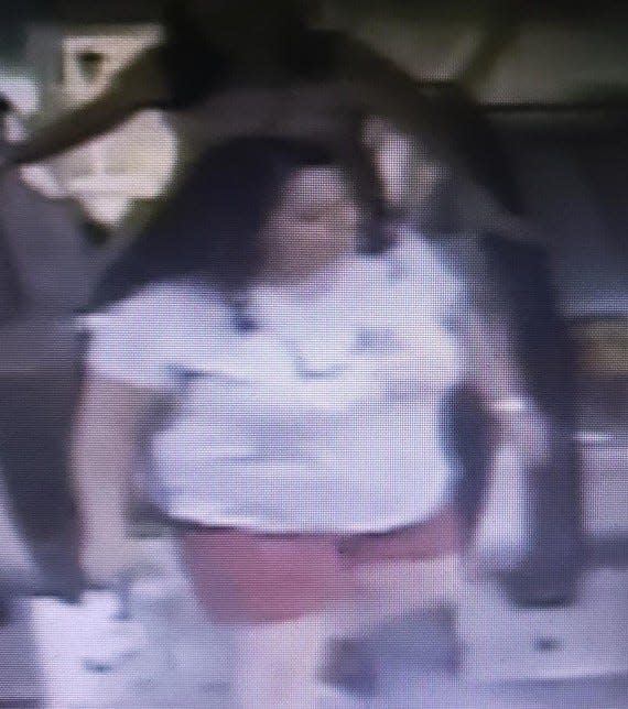 A woman wearing red shorts is sought by police in Fort Smith in connection with a swimwear case at Dillard's in Central Mall.