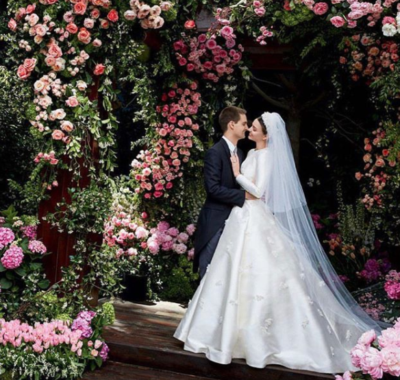 Miranda walked down the aisle in custom Dior. Photo: Instagram