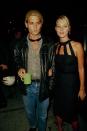 <p>A young model at the time, Kate Moss's black dress with a high neck and cut out details wowed on the red carpet alongside her boyfriend, Johnny Depp. </p>