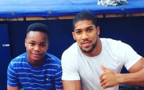 Jaden with his hero Anthony Joshua - Credit: Twitter