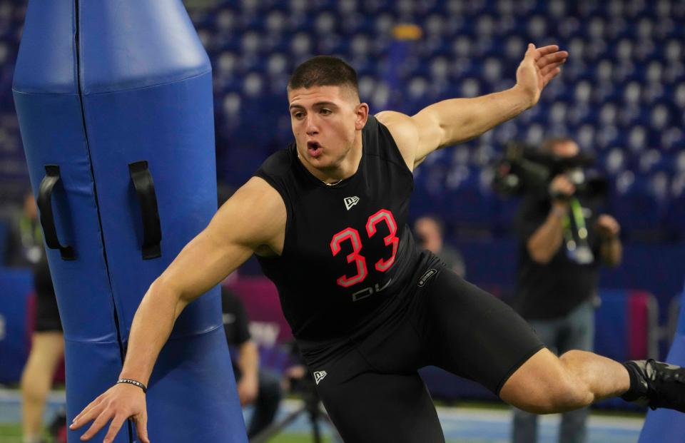 March 5: Purdue defensive lineman George Karlaftis goes through drills.