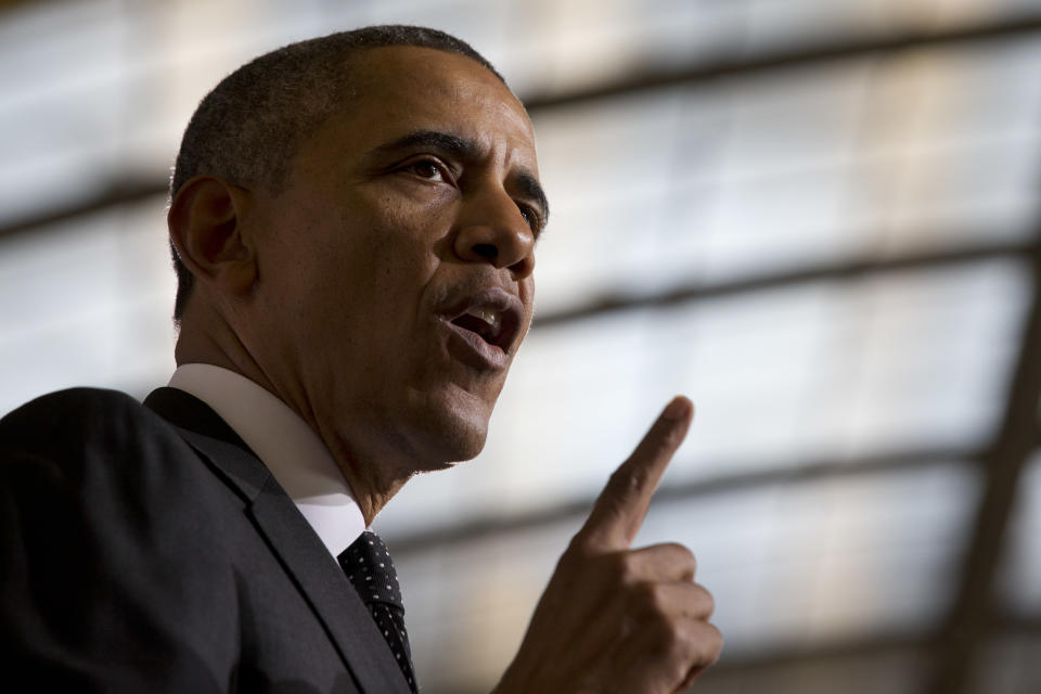 President Barack Obama speaks at Union Depot in St. Paul, Minn., Wednesday, Feb. 26, 2014, about a $300 billion transportation infrastructure plan. Obama spoke at Union Depot rail and bus station with a proposal asking Congress for $300 billion to update the nation's roads and railways, and about a competition to encourage investments to create jobs and restore infrastructure as part of the President’s Year of Action. (AP Photo/Jacquelyn Martin)