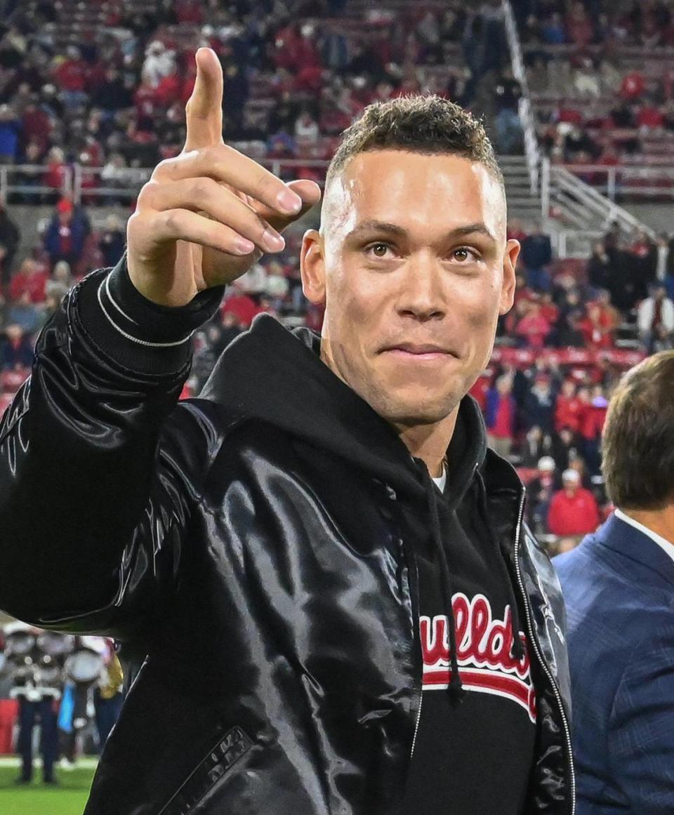 Former Fresno State baseball player Aaron Judge signals to the crowd following a jersey retirement celebration to retire at halftime of the Bulldogs’ game against New Mexico at Valley Children’s Stadium on Saturday, Nov. 18, 2023.