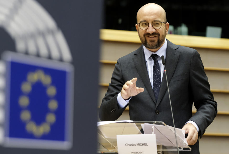 European Council President Charles Michel addresses the chamber on a report of last weeks EU summit during a plenary session at the European Parliament in Brussels, Wednesday, Oct. 21, 2020. (Olivier Hoslet, Pool via AP)