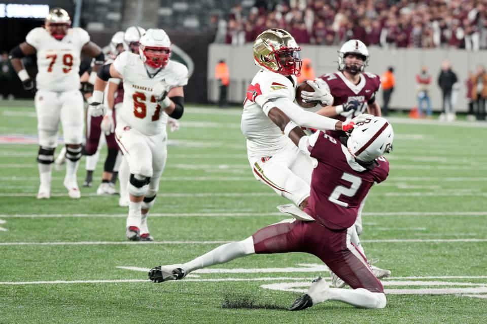 Don Bosco vs. Bergen Catholic in the Non-Public A football championship on Friday, November 25, 2022. BC #0 Quincy Porter avoids a tackle by DB #2 Sheaquan Walters in the second quarter. 