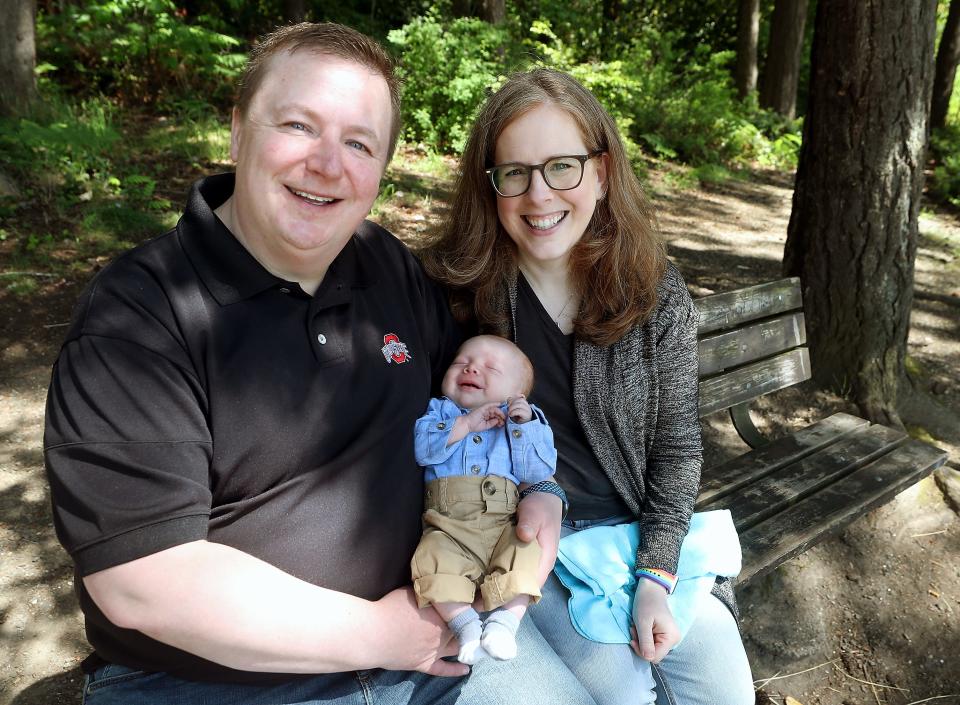 Pete and Leanne Wetzel with their son Charlie at Bainbridge Island's Waterfront Park on May 19.