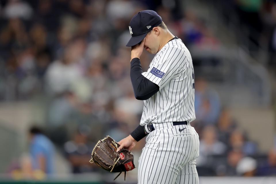 New York Yankees relief pitcher Tommy Kahnle reacts during the eighth inning against the Washington Nationals.