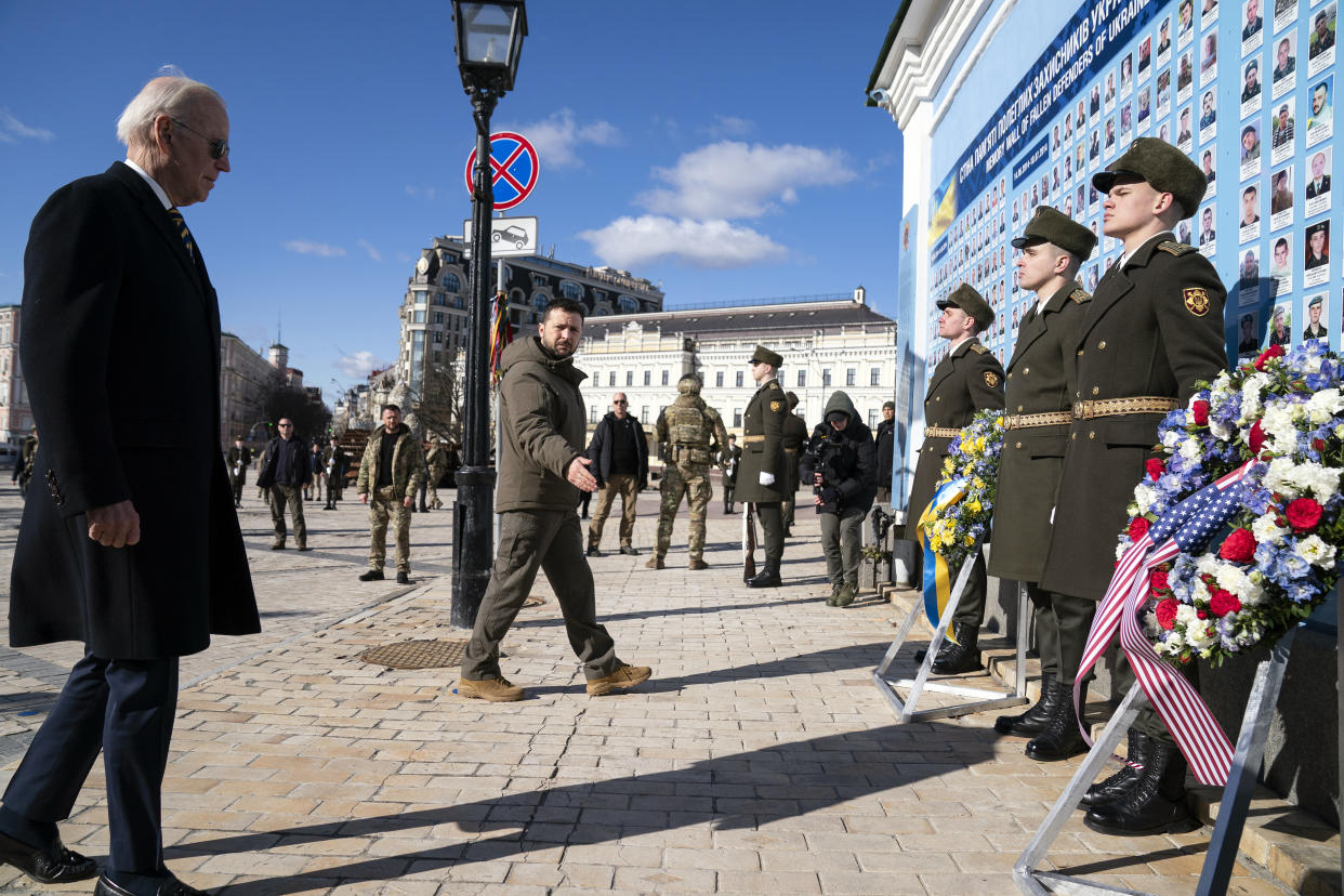 President Biden participates in a wreath-laying ceremony with President Zelensky at the memorial wall outside St. Michael's Golden-Domed Cathedral. 