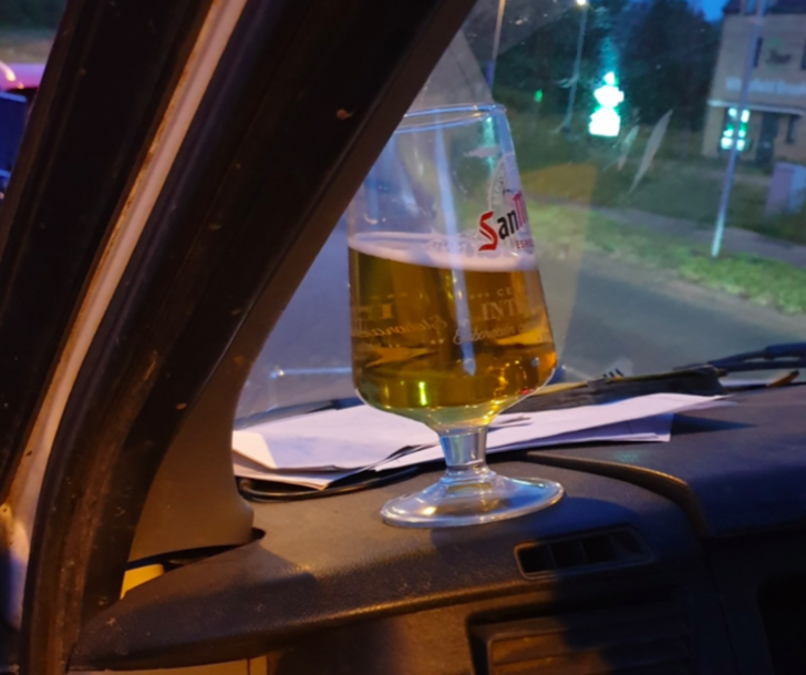 The driver's pint was found sitting on the dashboard of the van. (Twitter/@MerPolTraffic)