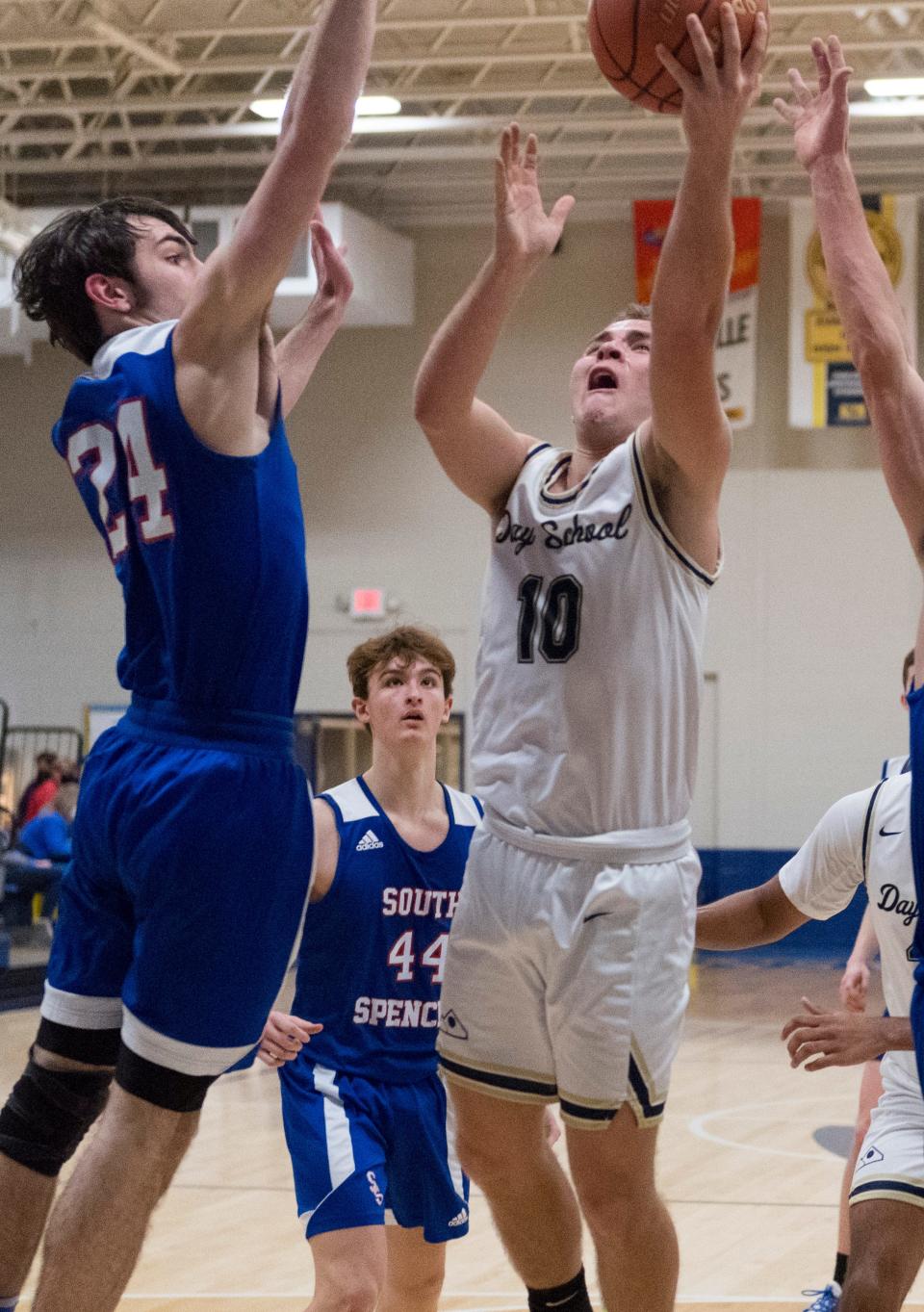 Evansville Day School’s Tyler Myers (10) takes a shot as the Eagles play the South Spencer Rebels in Evansville, Ind., Tuesday evening, Jan. 11, 2022. 