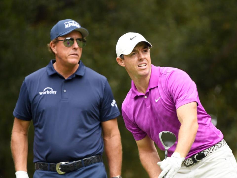Rory McIlroy and Phil Mickelson play alongside each other in 2020 (Getty Images)