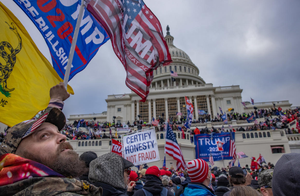 WASHINGTON,DC-JAN6: Supporters of President Trump storm the United States Capitol building.  (Photo by Evelyn Hockstein/For The Washington Post via Getty Images)