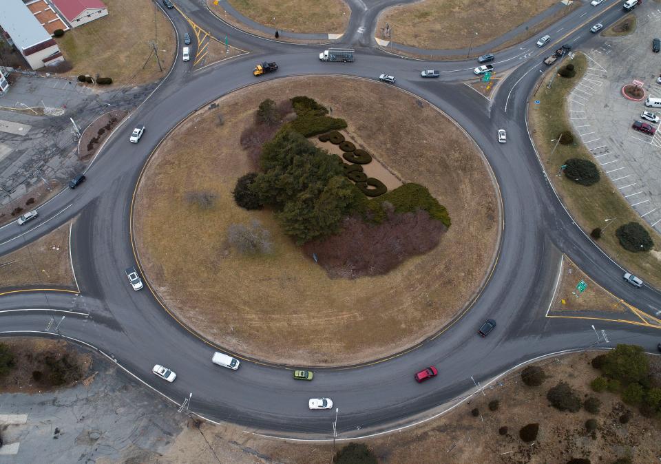 Traffic navigates the Bourne Rotary on Tuesday during the morning commute. A $1.8 million upgrade to the rotary planned by the state Department of Transportation has raised questions with the Bourne Select Board about timing and design.