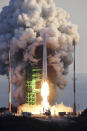 The Nuri rocket, the first domestically produced space rocket, lifts off from a launch pad at the Naro Space Center in Goheung, South Korea, Thursday, Oct. 21, 2021. (Korea Pool/Yonhap via AP)