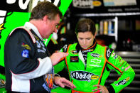 CONCORD, NC - MAY 24: Joe Nemechek (L), driver of the #87 AMFMEnergy.com/Pellet & Wood Stoves Toyota, talks with Danica Patrick (R), driver of the #7 GoDaddy.com Chevrolet, in the garage area during practice for the NASCAR Nationwide Series History 300 at Charlotte Motor Speedway on May 24, 2012 in Concord, North Carolina. (Photo by Jamey Price/Getty Images for NASCAR)