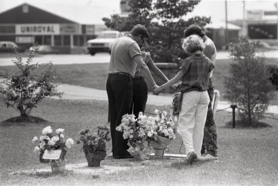 The family of Sharon Faye Smith, the murder victim of Larry Gene Bell, gathered at her grave on what would have been her 18th birthday, on June 24, 1985. Smith, a student at Lexington High, was abducted from her home and later found dead. Bell was executed for the crime in 1996, and chose the electric chair over lethal injection.