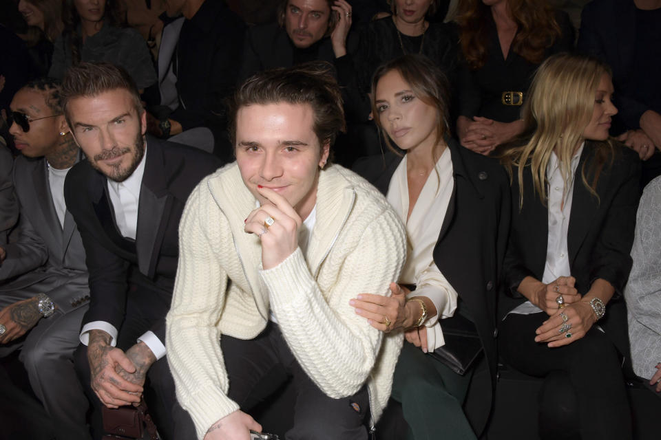 PARIS, FRANCE - JANUARY 17: (L to R) David Beckham, Brooklyn Beckham, Victoria Beckham and Kate Moss attend the Dior Homme Menswear Fall/Winter 2020-2021 show as part of Paris Fashion Week on January 17, 2020 in Paris, France.  (Photo by David M. Benett/Dave Benett/Getty Images)