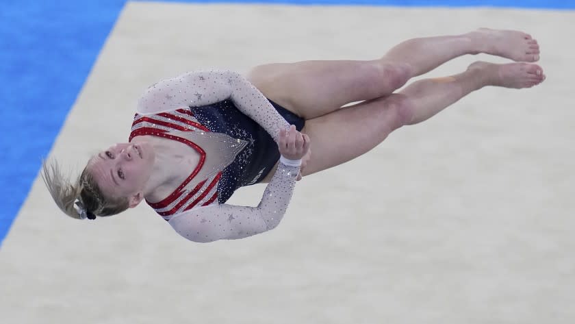 Jade Carey, of the United States, performs on the floor.