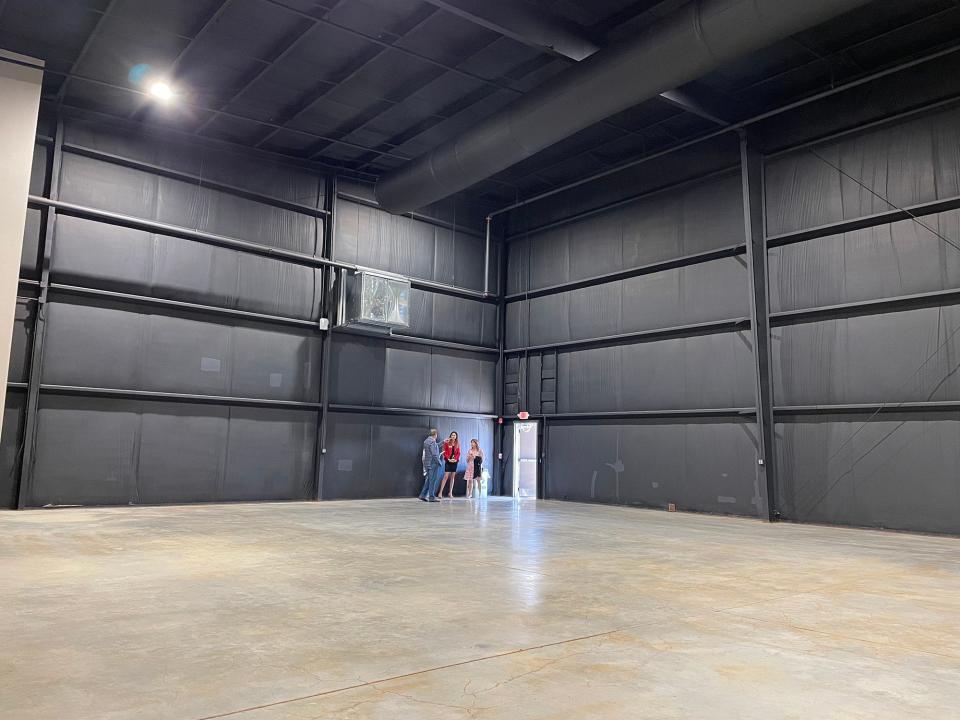 Visitors stand inside a 14,600-square-foot soundstage at Athena Studios campus in Athens, Ga. on Nov. 4, 2022. The studio has provided the space to the University of Georgia and the Georgia Film Academy for its students' exclusive use.