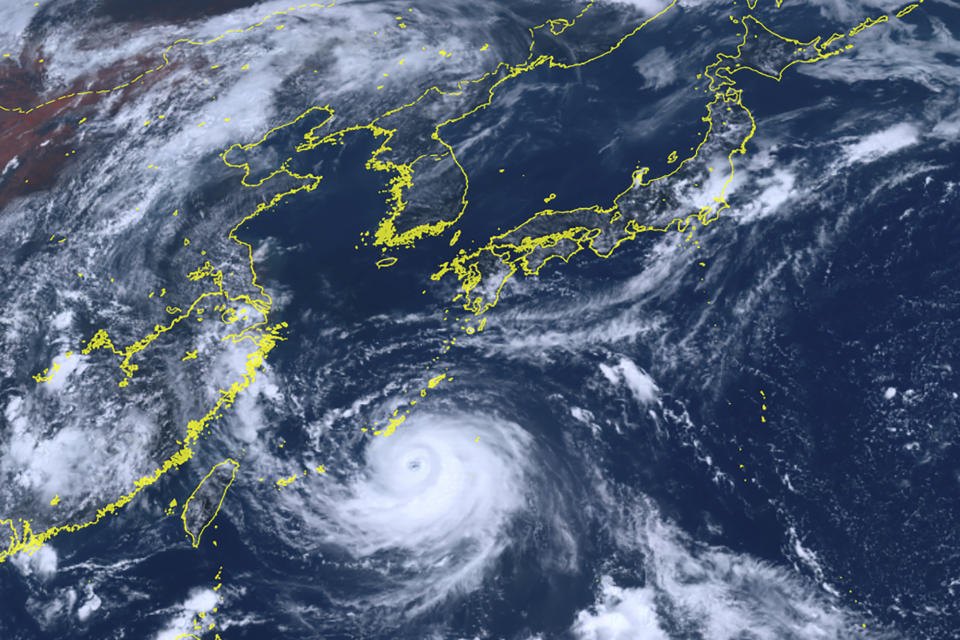 This satellite image provided by courtesy of the National Institute of Information and Communications Technology (NICT) shows Typhoon Khanun moving north towards Okinawa, southwestern Japan, Tuesday, Aug. 1, 2023. The powerful Typhoon Khanun was approaching Japan's southwestern island of Okinawa on Tuesday, lashing the region with strong winds and high waves, and forcing transportation to halt and stores to close. (Courtesy of National Institute of Information and Communications Technology (NICT) via AP)