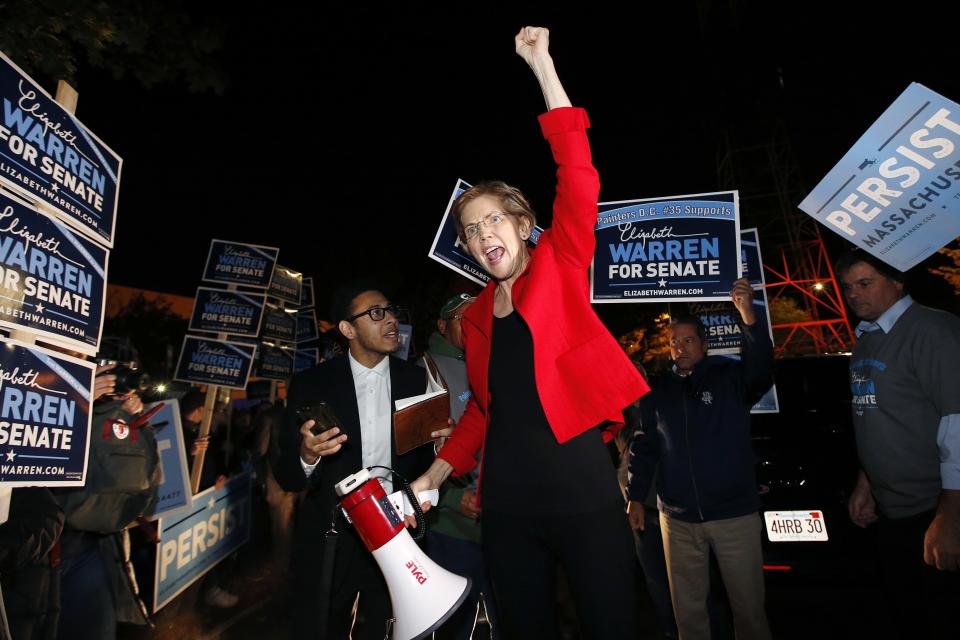 Sen. Elizabeth Warren greets supporters before a debate with her Republican opponent Geoff Diehl in Boston, Friday, Oct. 19, 2018. (AP Photo/Michael Dwyer)