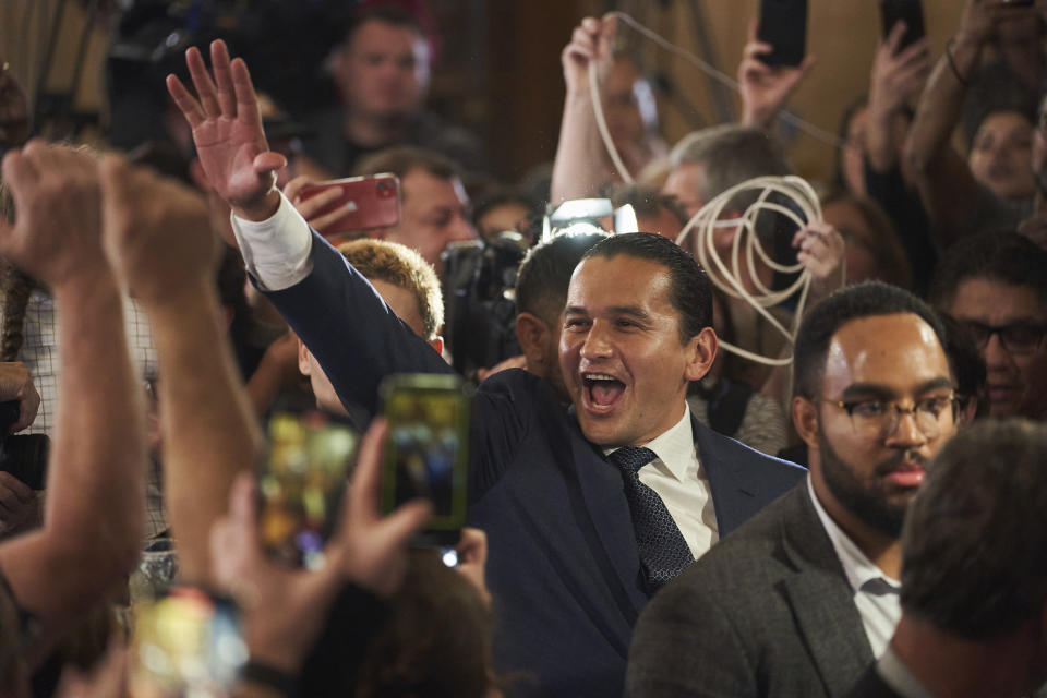 Manitoba NDP leader Wab Kinew greets supporters after winning the Manitoba Provincial election in Winnipeg, Manitoba, Tuesday, Oct. 3, 2023. The Canadian province of Manitoba has elected the first First Nations premier of a province in Canada. (David Lipnowski/The Canadian Press via AP)