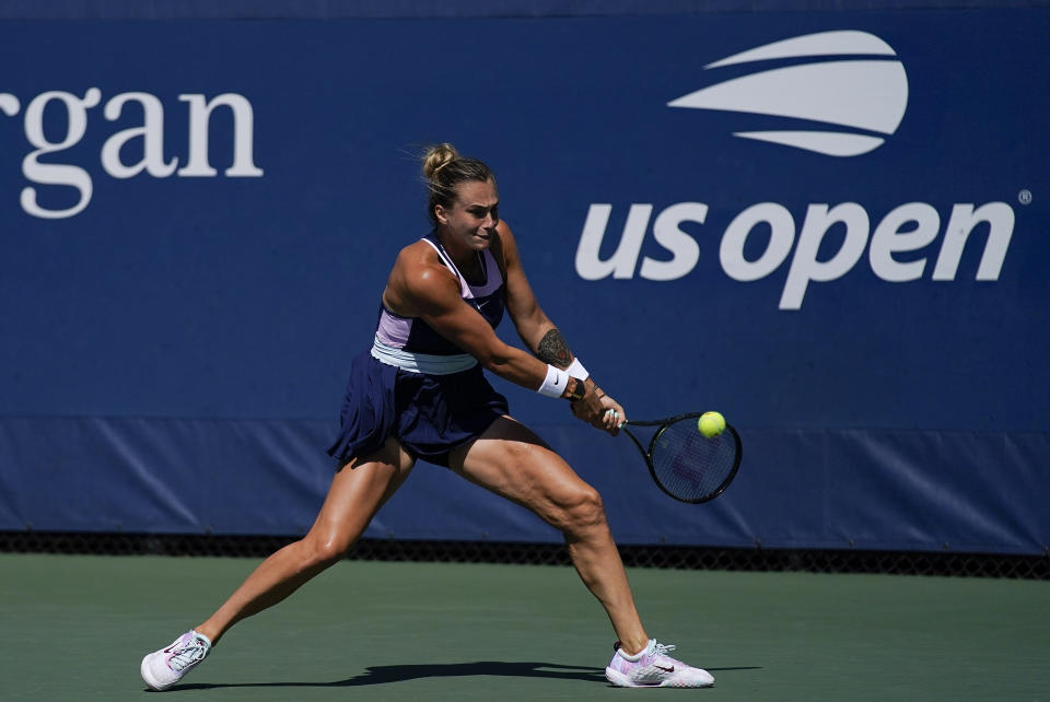 Aryna Sabalenka, of Belarus, returns a shot to Catherine Harrison, of the United States, during the first round of the US Open tennis championships, Tuesday, Aug. 30, 2022, in New York. (AP Photo/Julia Nikhinson)