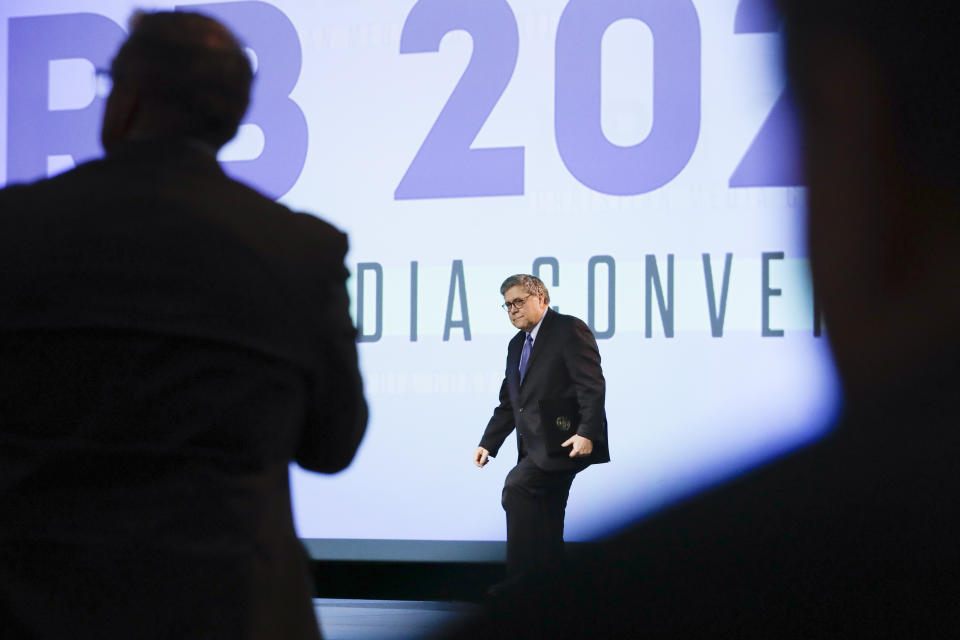 Attorney General William Barr is applauded as he takes the stage to speak at the National Religious Broadcasters Convention Wednesday, Feb. 26, 2020, in Nashville, Tenn. (AP Photo/Mark Humphrey)