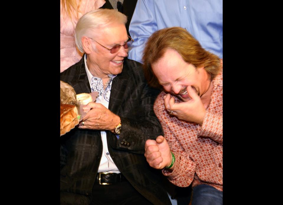 Country Music Legend George Jones and Singer/Songwriter  Travis Tritt celebrate at his George Jones' 80th birthday party at Rippy's Bar & Grill on Sep. 13, 2011 in Nashville, Tennessee.  (Rick Diamond, Getty Images)
