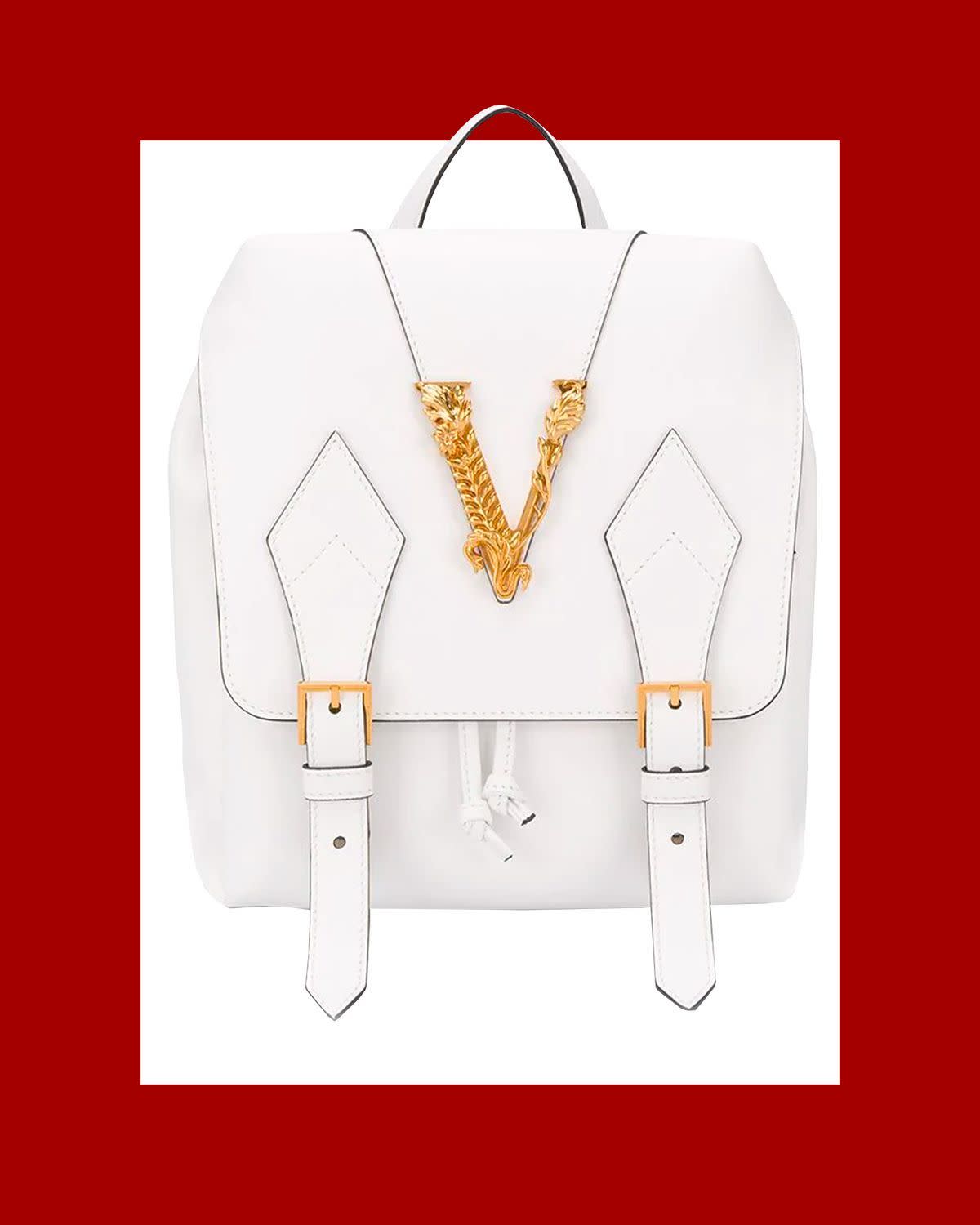 <p><a href="https://go.redirectingat.com?id=74968X1596630&url=https%3A%2F%2Fwww.farfetch.com%2Fshopping%2Fwomen%2Fversace-virtus-satchel-backpack-item-14762161.aspx&sref=https%3A%2F%2F" rel="nofollow noopener" target="_blank" data-ylk="slk:Shop Now;elm:context_link;itc:0;sec:content-canvas" class="link rapid-noclick-resp">Shop Now</a></p><p>Virtus Satchel Backpack</p><p>$3140.00</p><p>farfetch.com</p>