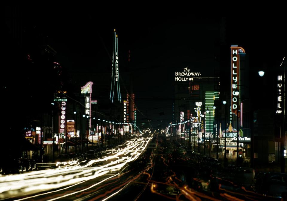 <p>Is there anything more glamorous than Hollywood at night? In 1951, you could look toward Hollywood Boulevard and see the Pantages Theatre and the Broadway Hollywood Building, among other locales. </p>