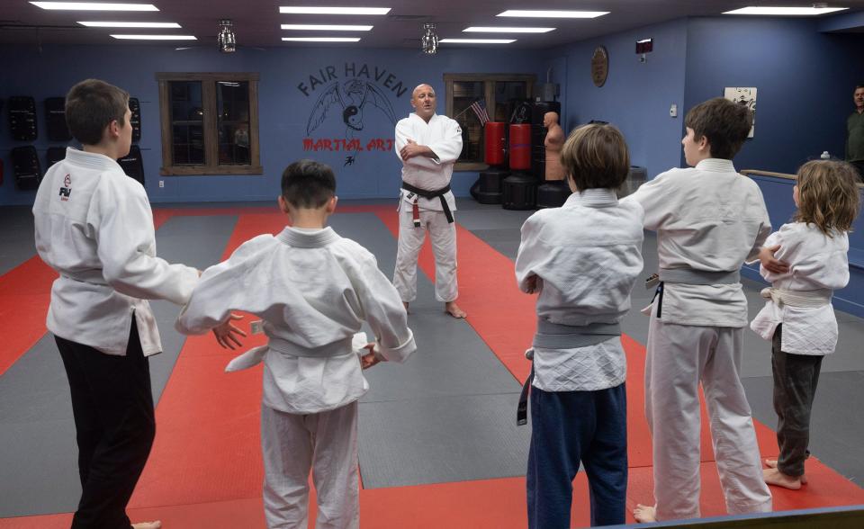 Jason David Tabor gives instructions as a class of 10- to 13-year-olds start their lesson at Fair Haven Martial Arts, which provides martial arts and fitness training for its customers. Wednesday, Feb. 1, 2023