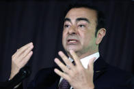 In this May 12, 2016, photo, then Nissan Motor Co. President and CEO Carlos Ghosn speaks during a joint press conference with Mitsubishi Motors Corp. in Yokohama, near Tokyo. Japanese media say Friday, Dec. 21, 2018, prosecutors press new allegation of breach of trust against Nissan ex-chair Ghosn, who is being detained in the Tokyo Detention Center. (AP Photo/Eugene Hoshiko)