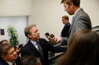 Reporters trail U.S. Senator Rand Paul (R-KY) as she arrives ahead of a vote on a bill to renew the National Security Agency's warrantless internet surveillance program, at the U.S. Capitol in Washington, U.S. January 18, 2018. REUTERS/Jonathan Ernst