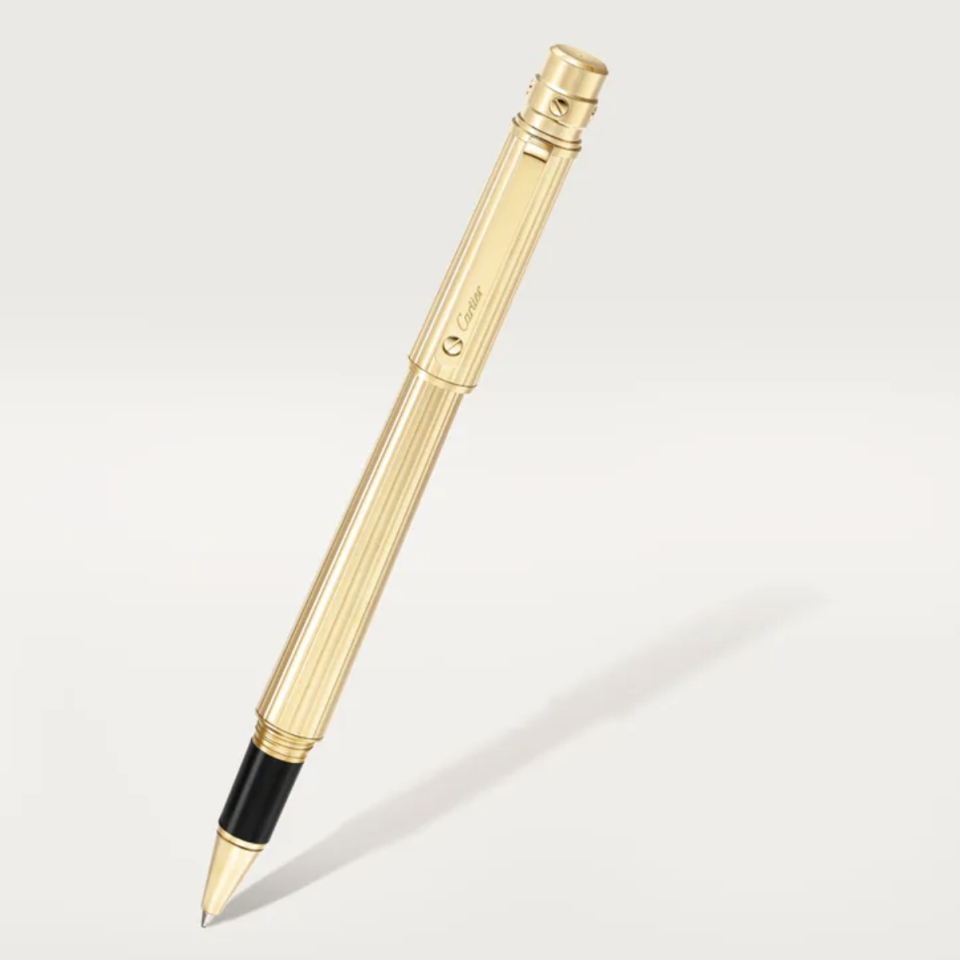 <p><a href="https://www.cartier.com/en-us/art-of-living/writing-%26-stationery/writing-instruments/santos-de-cartier-rollerball-pen-CROP000120.html" rel="nofollow noopener" target="_blank" data-ylk="slk:Shop Now;elm:context_link;itc:0;sec:content-canvas" class="link ">Shop Now</a></p><p>Santos de Cartier rollerball pen</p><p>$1130.00</p><p>cartier.com</p><span class="copyright">Cartier</span>