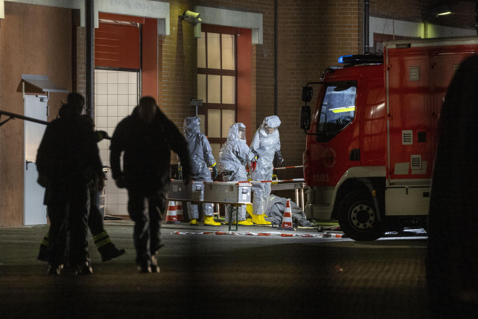 Substances found during the search are examined on the premises of the fire department in Castrop-Rauxel, Sunday, Jan.8, 2023. In Castrop-Rauxel, there was a large-scale operation by the police and fire department on Saturday evening. A special task force (SEK) was also on the scene, a police spokeswoman told the German Press Agency on Saturday evening. (Christoph Reichwein/dpa via AP)