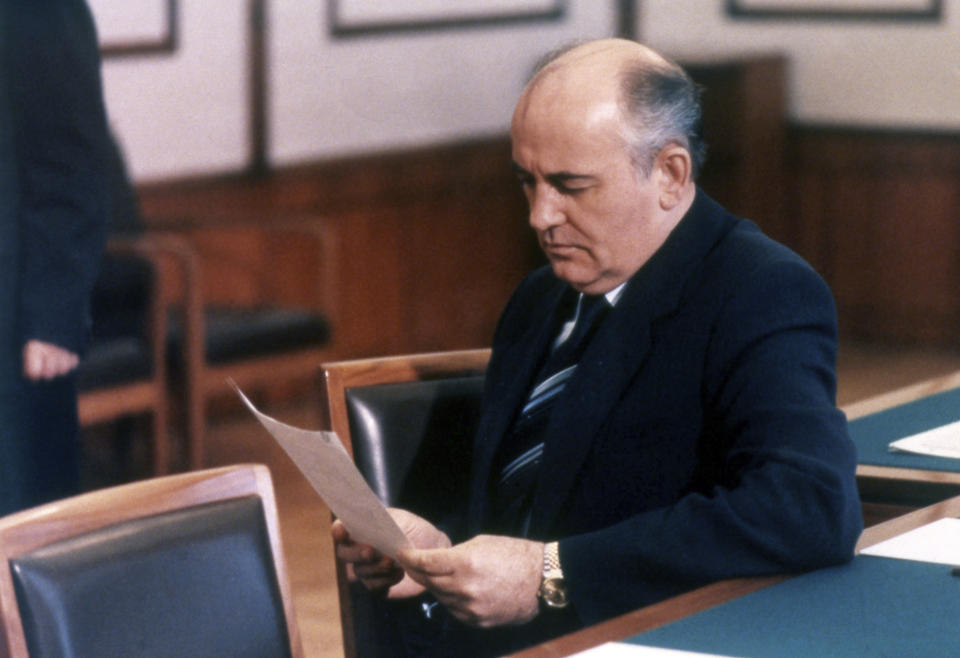 FILE - Mikhail S. Gorbachev, who became the new Soviet leader following the death of President Constantin Chernenko, studies papers in his Kremlin office on May 1985. Former Soviet leader Mikhail Gorbachev has died Tuesday Aug. 30, 2022 at a Moscow hospital at age 91. (AP Photo/Boris Yurchenko, File)