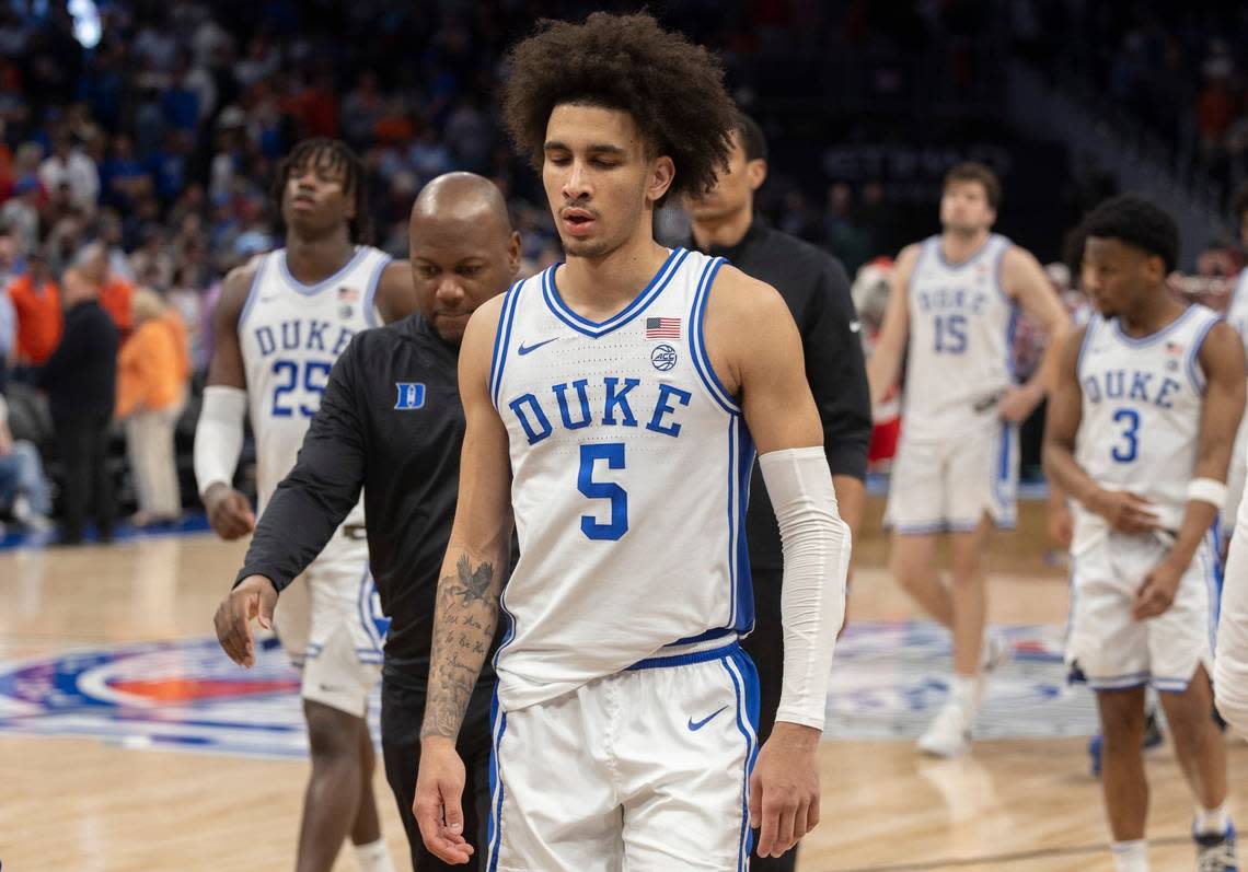 Duke’s Tyrese Proctor (5) and his teammates leave the court following their 79-64 loss to N.C. State in the quarterfinals of the ACC Men’s Basketball Tournament at Capitol One Arena on Wednesday, March 13, 2024 in Washington, D.C.