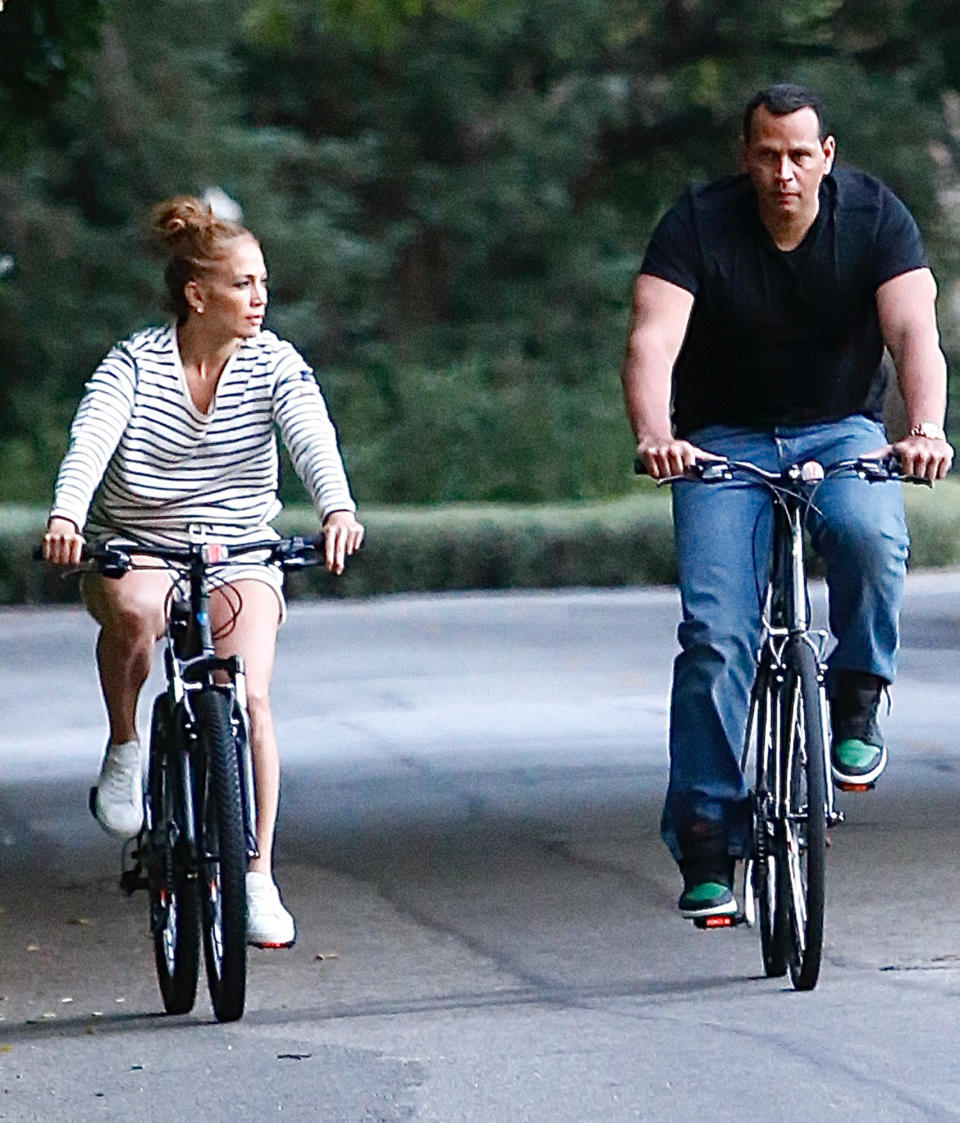 <p>Jennifer Lopez and Alex Rodriguez enjoy a quiet Friday ride around their Bel-Air, California, neigborhood. </p>