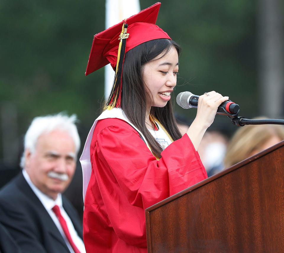 Salutatorian Adelin Chan delivers a speech at North Quincy High commencement at Veterans Memorial Stadium on Monday, June 6, 2022.