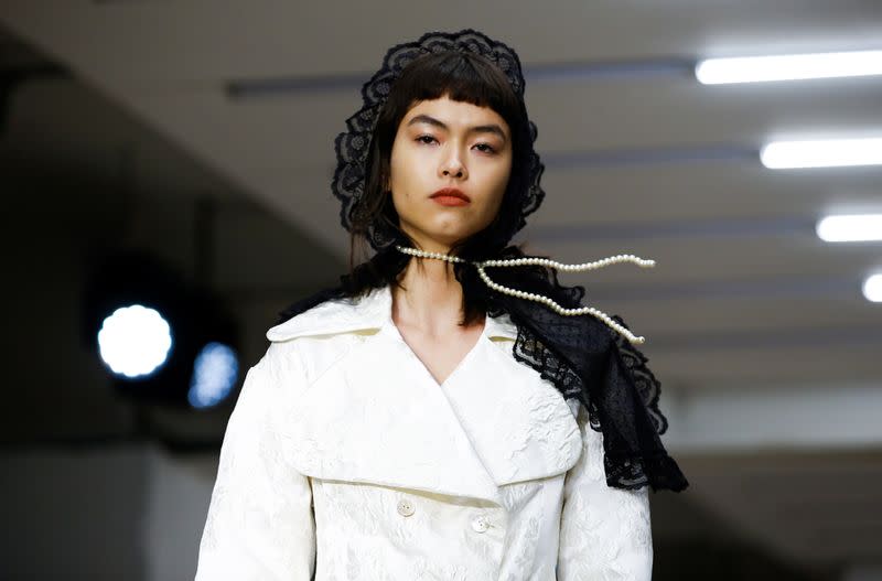 Models present creations during the Yuhan Wang catwalk show at London Fashion Week in London