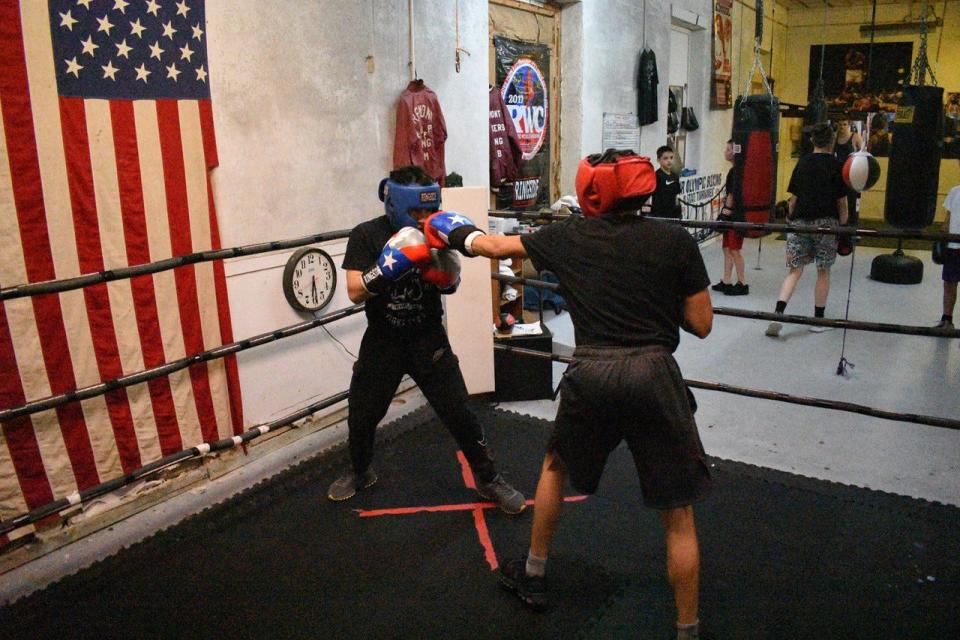 Elias Jimenez, left, and Alejandro Bonilla spar at Fremont Wreckers Boxing Club on May 4.