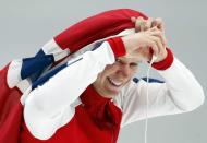 Speed Skating - Pyeongchang 2018 Winter Olympics - Men's 500m competition finals - Gangneung Oval - Gangneung, South Korea - February 19, 2018 - Havard Lorentzen of Norway celebrates after winning a gold medal. REUTERS/John Sibley