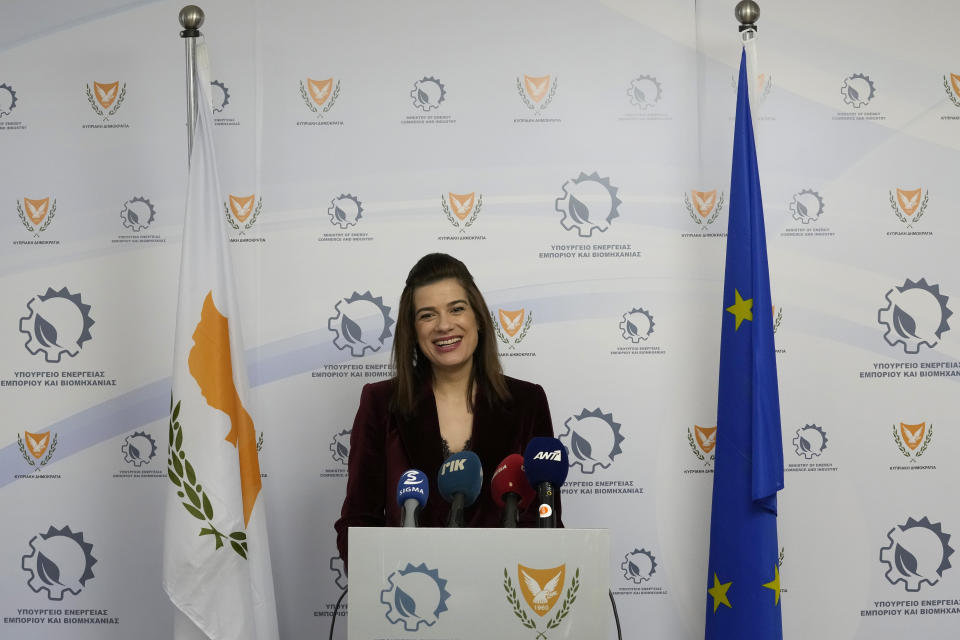 Cypriot Energy Minister Natasa Pilides talks to the media during a press conference at the Energy ministry in Nicosia, Cyprus, Thursday, Jan. 27, 2022. Pilides said that the European Union has earmarked 657 million euros ($736 million) for the construction of a a 2,000 megawatt undersea electricity cable linking the power grids of Israel, Cyprus and Greece. (AP Photo/Petros Karadjias)