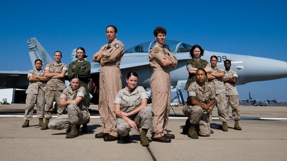 Amy McGrath (standing, front right) with fellow female veterans. (Photo: Courtesy of Amy McGrath)