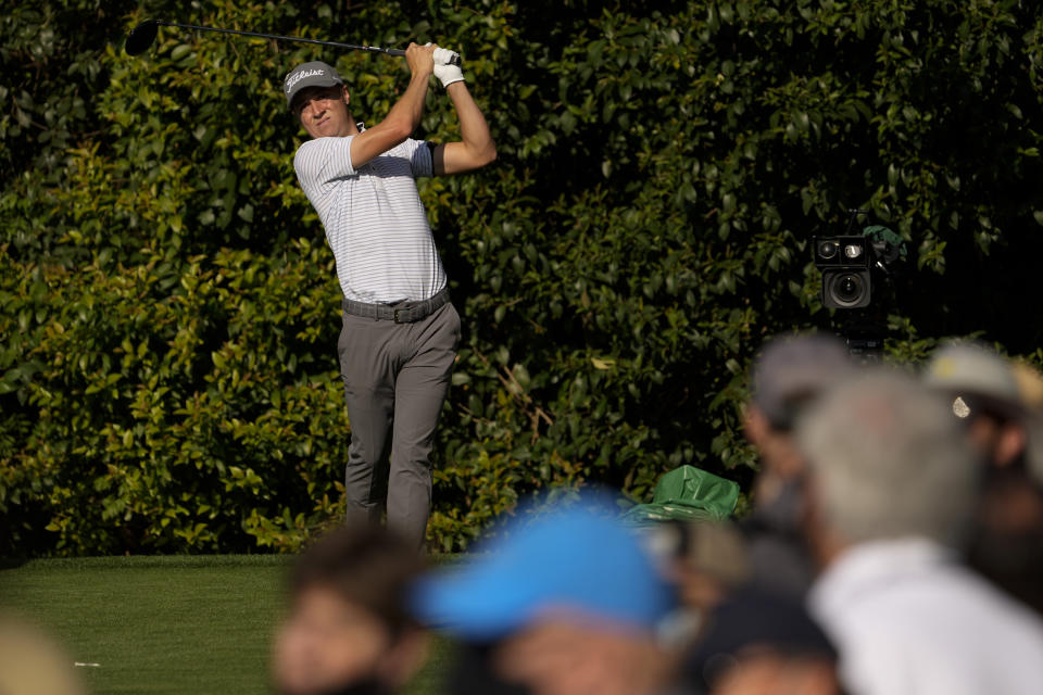 Justin Thomas watches his tee shot on the 14th hole during a practice round for the Masters golf tournament on Tuesday, April 6, 2021, in Augusta, Ga. (AP Photo/David J. Phillip)