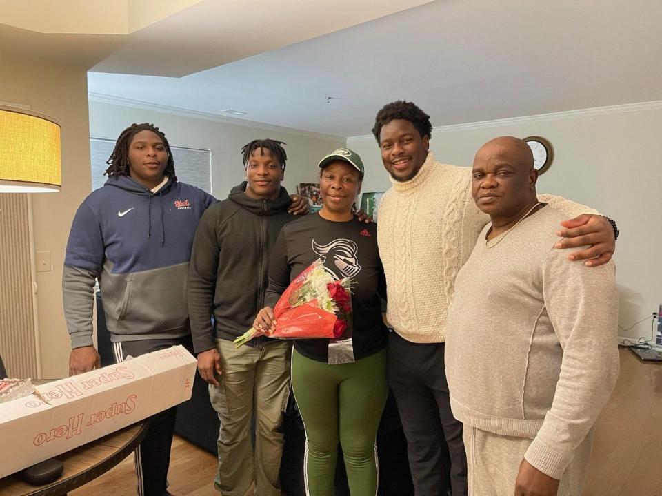 Jacksonville Jaguars defensive tackle Foley Fatukasi (second from right) with brothers Tunde (far left) and Olakunle, and parents Ifedola and Michael.